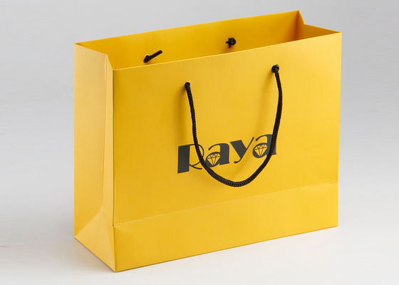 Manija de nylon de papel mate amarilla de los bolsos de compras y logotipo modificado para requisitos particulares impresos