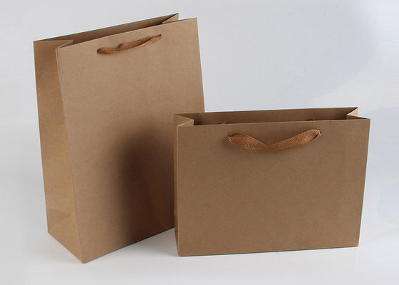 Bolsas de papel a granel rectangulares modificadas para requisitos particulares, bolsos de compras llanos de Kraft con las manijas