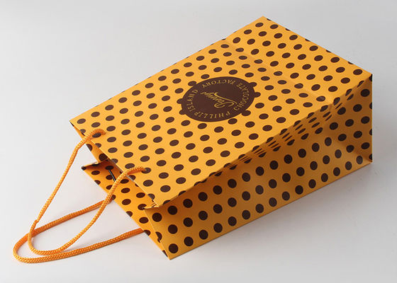Bolsos decorativos del embalaje del regalo de la manija de nylon con el sello de la hoja de oro y el modelo de punto calientes